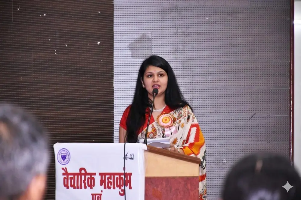 Anupriya Tripathi speaking at a podium